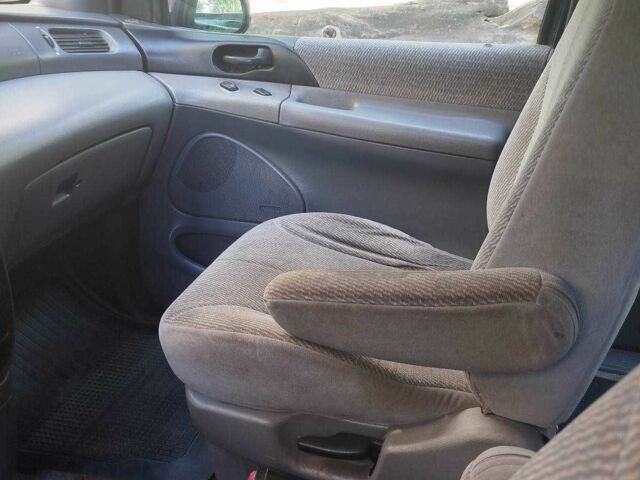 Синий Форд Виндстар, объемом двигателя 3 л и пробегом 330 тыс. км за 2200 $, фото 2 на Automoto.ua