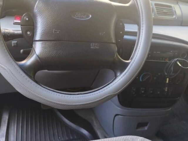 Синий Форд Виндстар, объемом двигателя 3 л и пробегом 330 тыс. км за 2200 $, фото 13 на Automoto.ua