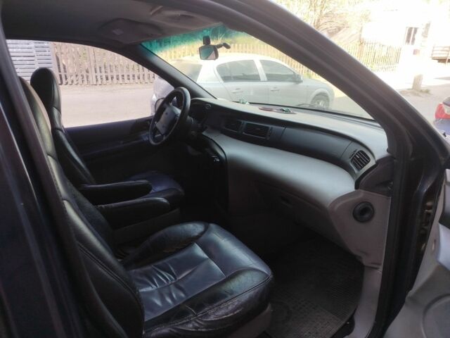 Синий Форд Виндстар, объемом двигателя 3 л и пробегом 450 тыс. км за 2600 $, фото 3 на Automoto.ua