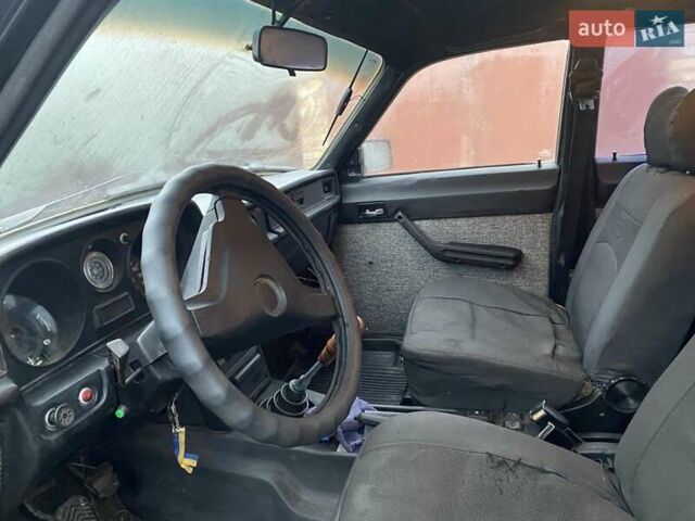 Черный ГАЗ 31029 Волга, объемом двигателя 2.45 л и пробегом 250 тыс. км за 826 $, фото 4 на Automoto.ua