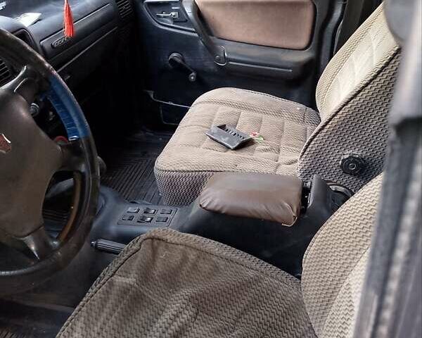 Чорний ГАЗ 3110 Волга, об'ємом двигуна 2.4 л та пробігом 150 тис. км за 719 $, фото 10 на Automoto.ua