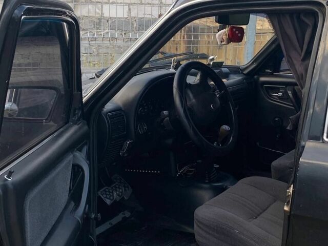 Черный ГАЗ 3110 Волга, объемом двигателя 2.4 л и пробегом 223 тыс. км за 1275 $, фото 4 на Automoto.ua