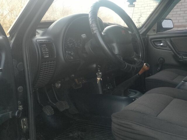 Черный ГАЗ 3110 Волга, объемом двигателя 2.4 л и пробегом 100 тыс. км за 2000 $, фото 4 на Automoto.ua