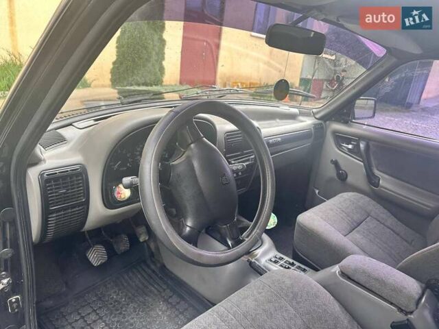 Черный ГАЗ 3110 Волга, объемом двигателя 2.4 л и пробегом 39 тыс. км за 1750 $, фото 8 на Automoto.ua