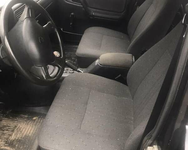 Черный ГАЗ 3110 Волга, объемом двигателя 2.4 л и пробегом 150 тыс. км за 1100 $, фото 1 на Automoto.ua