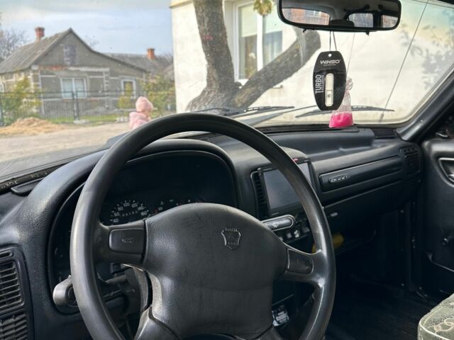 Чорний ГАЗ 3110 Волга, об'ємом двигуна 2.4 л та пробігом 208 тис. км за 750 $, фото 2 на Automoto.ua