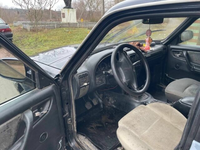 Черный ГАЗ 3110 Волга, объемом двигателя 2.3 л и пробегом 200 тыс. км за 782 $, фото 4 на Automoto.ua