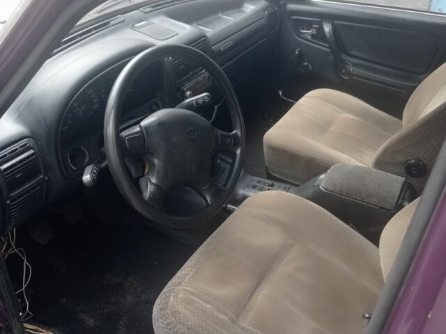 Фиолетовый ГАЗ 3110 Волга, объемом двигателя 2.4 л и пробегом 210 тыс. км за 834 $, фото 5 на Automoto.ua