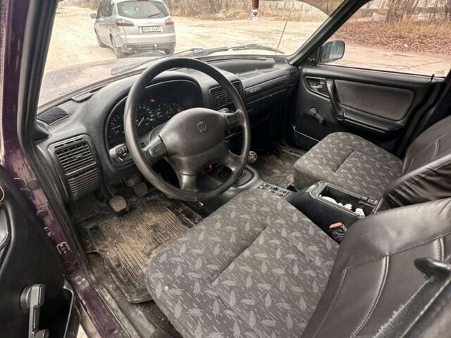 Фіолетовий ГАЗ 3110 Волга, об'ємом двигуна 2.4 л та пробігом 352 тис. км за 485 $, фото 3 на Automoto.ua