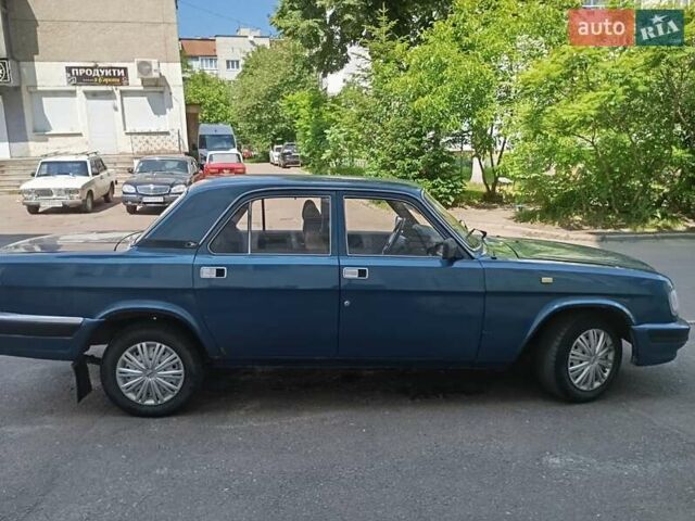 Синий ГАЗ 3110 Волга, объемом двигателя 2.45 л и пробегом 100 тыс. км за 1000 $, фото 1 на Automoto.ua