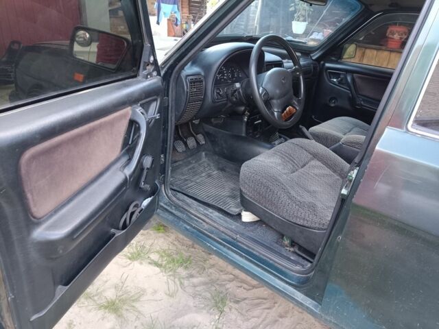 Зеленый ГАЗ 3110 Волга, объемом двигателя 0 л и пробегом 222 тыс. км за 1100 $, фото 2 на Automoto.ua