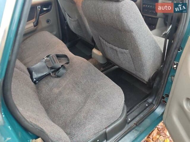 Зелений ГАЗ 3110 Волга, об'ємом двигуна 2.4 л та пробігом 200 тис. км за 950 $, фото 1 на Automoto.ua