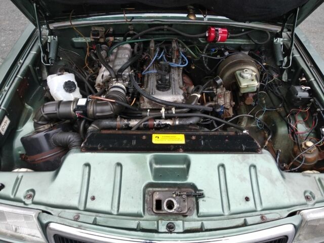 Зеленый ГАЗ 3110 Волга, объемом двигателя 2.3 л и пробегом 250 тыс. км за 616 $, фото 10 на Automoto.ua