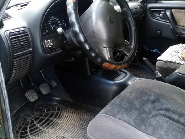 Зеленый ГАЗ 3110 Волга, объемом двигателя 2.8 л и пробегом 33 тыс. км за 5000 $, фото 6 на Automoto.ua