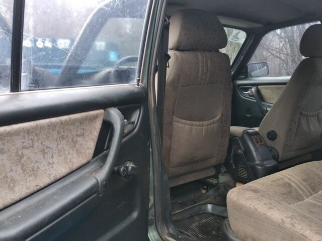 Зеленый ГАЗ 3110 Волга, объемом двигателя 2.3 л и пробегом 250 тыс. км за 616 $, фото 15 на Automoto.ua