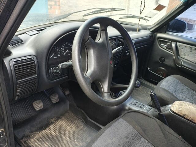 Черный ГАЗ 31105 Волга, объемом двигателя 2.4 л и пробегом 62 тыс. км за 2140 $, фото 1 на Automoto.ua