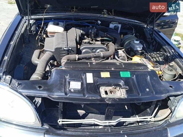 Черный ГАЗ 31105 Волга, объемом двигателя 2.43 л и пробегом 102 тыс. км за 3800 $, фото 4 на Automoto.ua