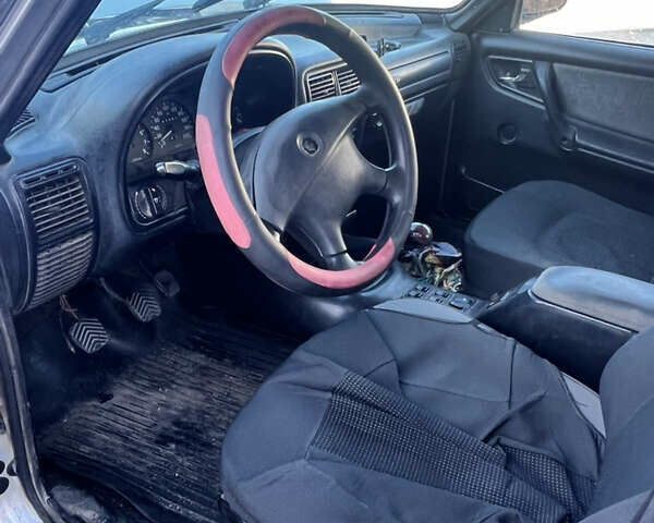 ГАЗ 31105 Волга 2004 в Николаеве на Automoto.ua Красный ГАЗ 31105 Волга, объемом двигателя 2.43 л и пробегом 190 тыс. км за 850 $, фото 3 на Automoto.ua