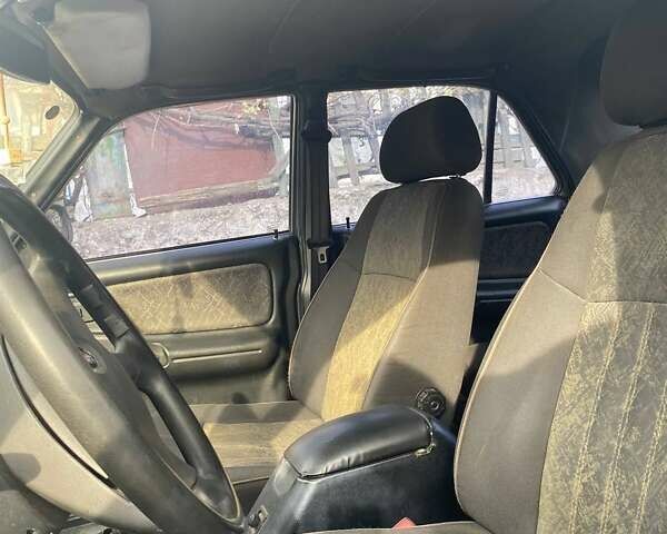 Сірий ГАЗ 31105 Волга, об'ємом двигуна 2.3 л та пробігом 440 тис. км за 990 $, фото 25 на Automoto.ua