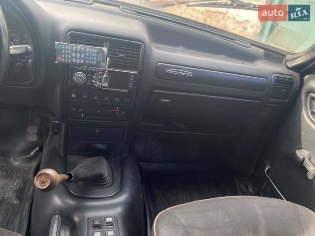 Сірий ГАЗ 31105 Волга, об'ємом двигуна 2.3 л та пробігом 440 тис. км за 990 $, фото 26 на Automoto.ua