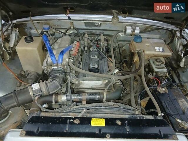 Серый ГАЗ 31105 Волга, объемом двигателя 2.3 л и пробегом 248 тыс. км за 1781 $, фото 4 на Automoto.ua