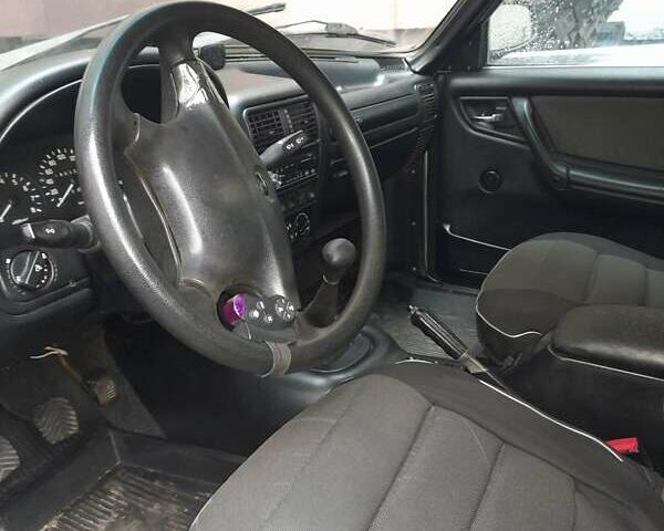 Серый ГАЗ 31105 Волга, объемом двигателя 2.3 л и пробегом 181 тыс. км за 1893 $, фото 3 на Automoto.ua