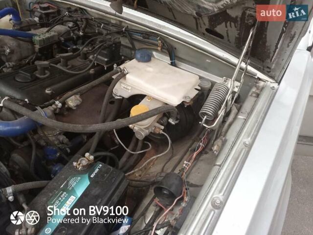 Серый ГАЗ 31105 Волга, объемом двигателя 2.3 л и пробегом 225 тыс. км за 2000 $, фото 16 на Automoto.ua