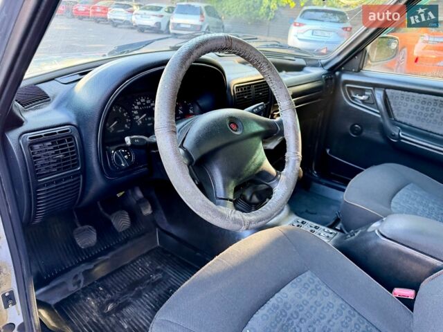 Сірий ГАЗ 31105 Волга, об'ємом двигуна 2.3 л та пробігом 91 тис. км за 1600 $, фото 31 на Automoto.ua