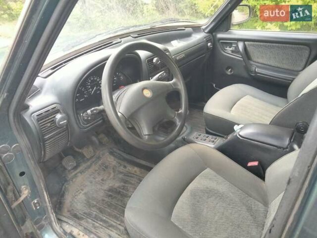 Зелений ГАЗ 31105 Волга, об'ємом двигуна 2.29 л та пробігом 180 тис. км за 750 $, фото 4 на Automoto.ua