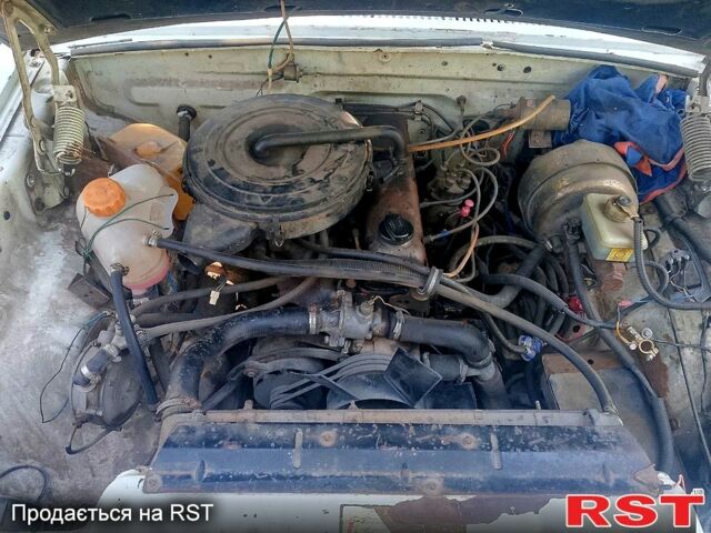 Белый ГАЗ Волга, объемом двигателя 2.4 л и пробегом 370 тыс. км за 470 $, фото 2 на Automoto.ua