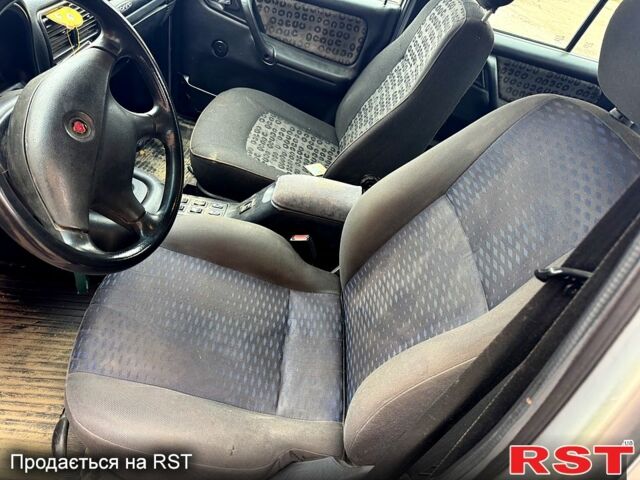 Серый ГАЗ Волга, объемом двигателя 2.3 л и пробегом 170 тыс. км за 1400 $, фото 4 на Automoto.ua