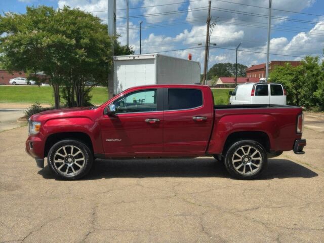 Красный ДжиЭмСи Канйон, объемом двигателя 3.6 л и пробегом 41 тыс. км за 6500 $, фото 3 на Automoto.ua