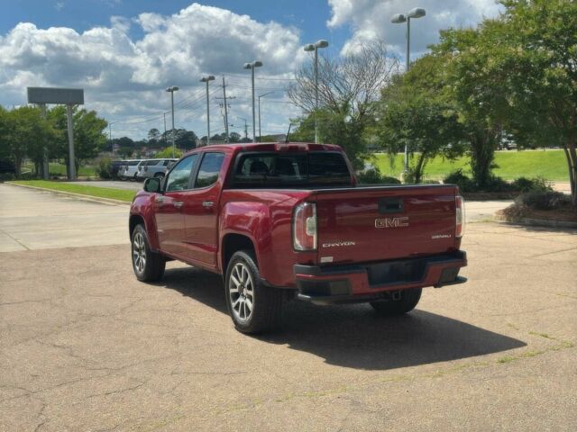 Красный ДжиЭмСи Канйон, объемом двигателя 3.6 л и пробегом 41 тыс. км за 6500 $, фото 4 на Automoto.ua