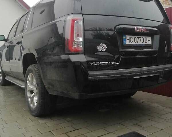 Черный ДжиЭмСи Юкон, объемом двигателя 5.33 л и пробегом 141 тыс. км за 35000 $, фото 1 на Automoto.ua