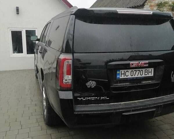 Черный ДжиЭмСи Юкон, объемом двигателя 5.33 л и пробегом 141 тыс. км за 35000 $, фото 2 на Automoto.ua