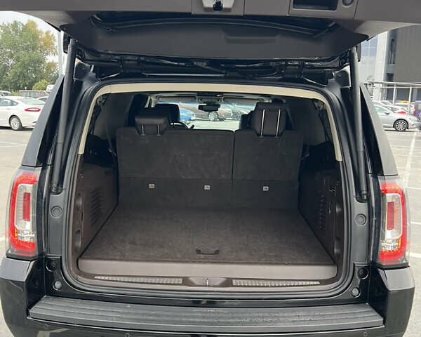 Чорний ДжіЕмСі Yukon, об'ємом двигуна 6.16 л та пробігом 129 тис. км за 25999 $, фото 14 на Automoto.ua