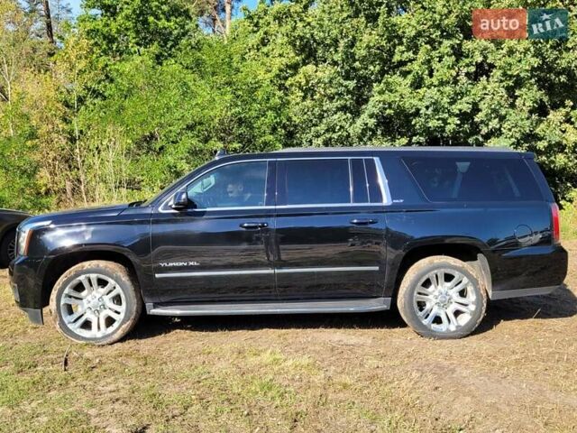 Черный ДжиЭмСи Юкон, объемом двигателя 5.33 л и пробегом 101 тыс. км за 50000 $, фото 1 на Automoto.ua
