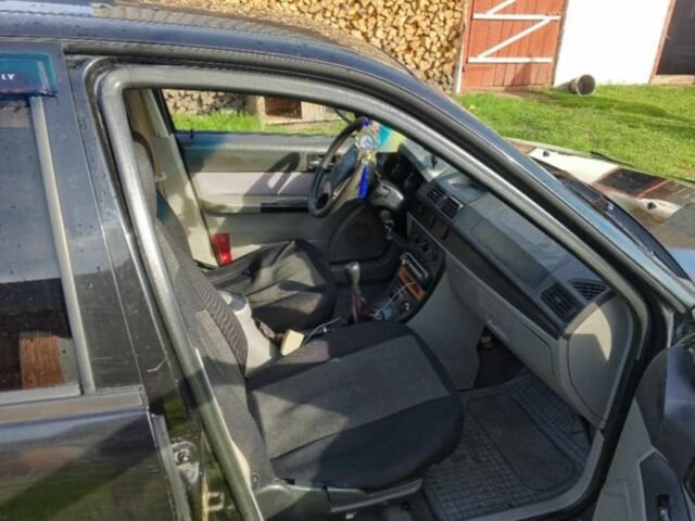 Черный Джили ЦК, объемом двигателя 1.5 л и пробегом 92 тыс. км за 1300 $, фото 5 на Automoto.ua