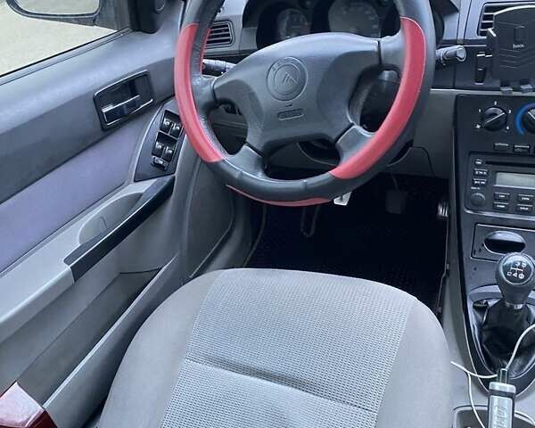 Черный Джили ЦК, объемом двигателя 1.5 л и пробегом 161 тыс. км за 2400 $, фото 6 на Automoto.ua