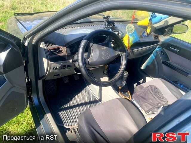 Серый Джили ЦК, объемом двигателя 1.5 л и пробегом 215 тыс. км за 1600 $, фото 2 на Automoto.ua