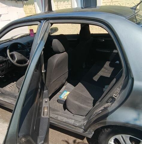 Серый Джили ЦК, объемом двигателя 1.5 л и пробегом 233 тыс. км за 1999 $, фото 5 на Automoto.ua