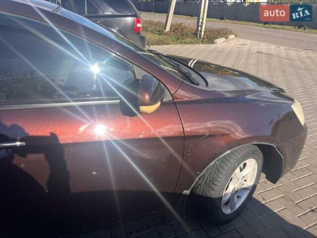 Коричневый Джили Эмгранд 7 (EC7), объемом двигателя 1.79 л и пробегом 260 тыс. км за 2100 $, фото 13 на Automoto.ua