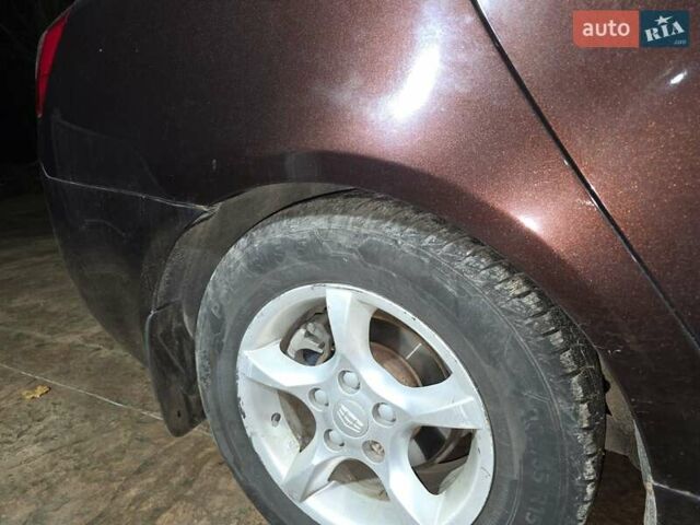 Коричневый Джили Эмгранд 7 (EC7), объемом двигателя 1.79 л и пробегом 131 тыс. км за 4300 $, фото 24 на Automoto.ua