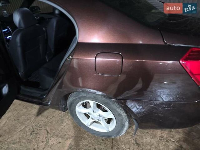 Коричневый Джили Эмгранд 7 (EC7), объемом двигателя 1.79 л и пробегом 131 тыс. км за 4300 $, фото 3 на Automoto.ua