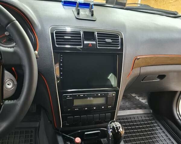 Белый Джили Emgrand 8 (EC8), объемом двигателя 2 л и пробегом 103 тыс. км за 6500 $, фото 19 на Automoto.ua