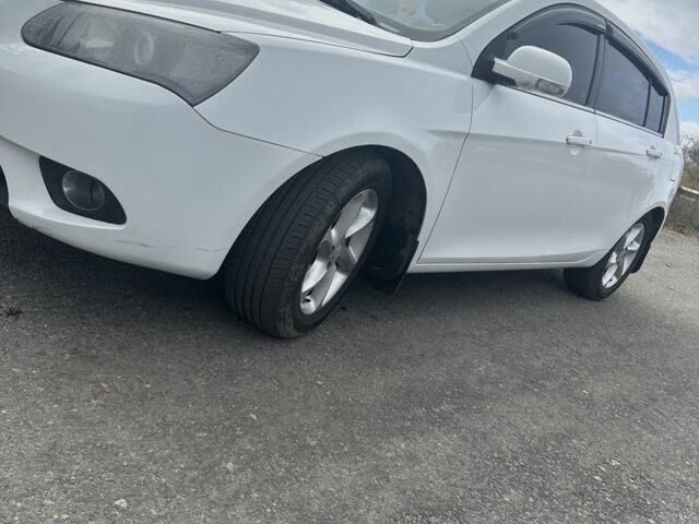 Белый Джили Эмгранд, объемом двигателя 1.8 л и пробегом 107 тыс. км за 4999 $, фото 1 на Automoto.ua