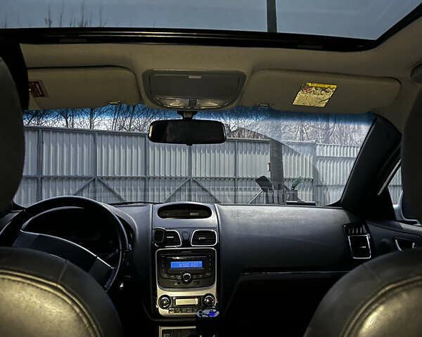 Белый Джили Эмгранд, объемом двигателя 1.79 л и пробегом 193 тыс. км за 4500 $, фото 11 на Automoto.ua