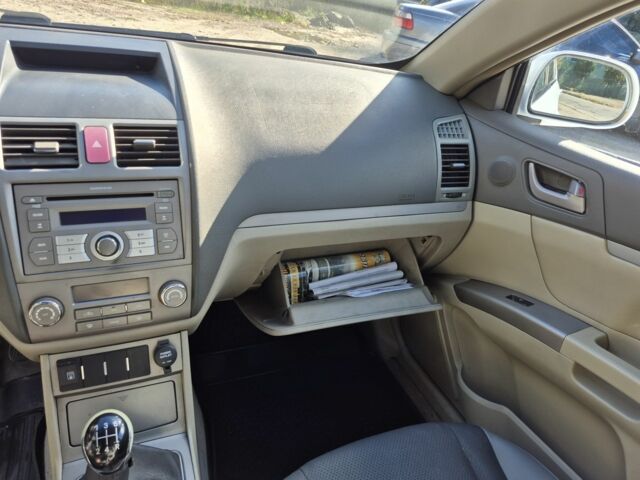 Белый Джили Эмгранд, объемом двигателя 1.8 л и пробегом 198 тыс. км за 3333 $, фото 6 на Automoto.ua