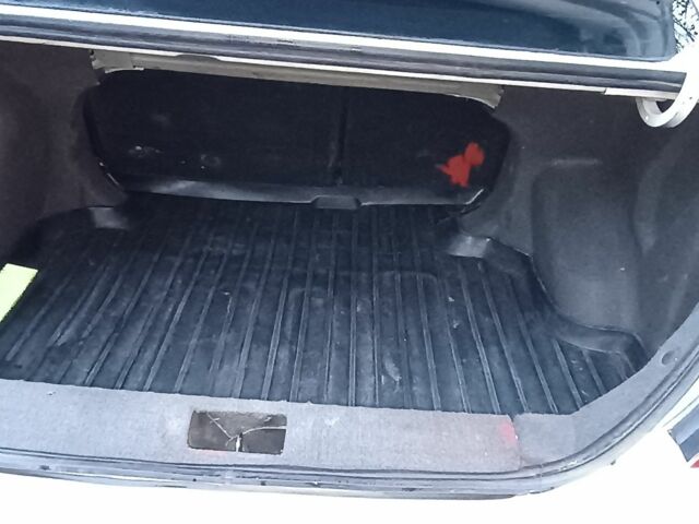 Білий Джилі Емгранд, об'ємом двигуна 1.8 л та пробігом 219 тис. км за 4200 $, фото 9 на Automoto.ua