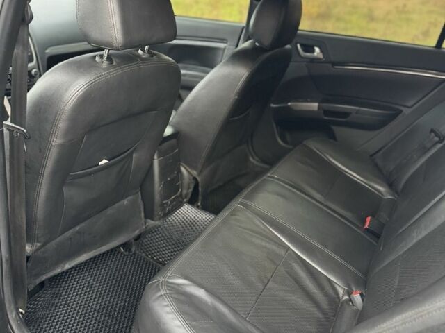 Джили Эмгранд 2013 в Кривом Роге на Automoto.ua Белый Джили Эмгранд, объемом двигателя 1.8 л и пробегом 234 тыс. км за 4000 $, фото 19 на Automoto.ua